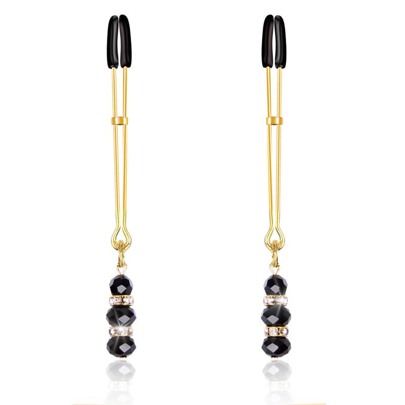 PINZAS BDSM LINE PARA PEZONES CON BOLAS DE CRISTAL DORADO